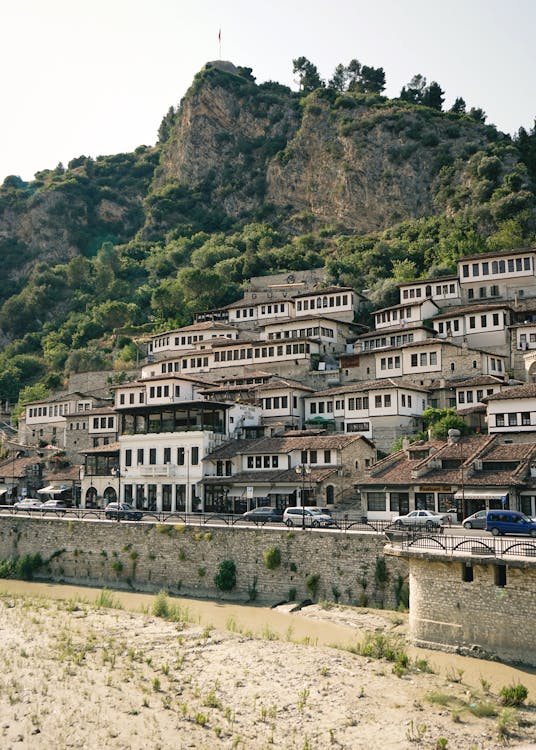 Historic Ottoman white houses of Berat, Albania, cascading down the hillside above the Osum River
