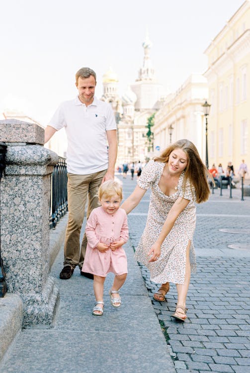 Happy family with children smiling outdoors on a tour adventure together