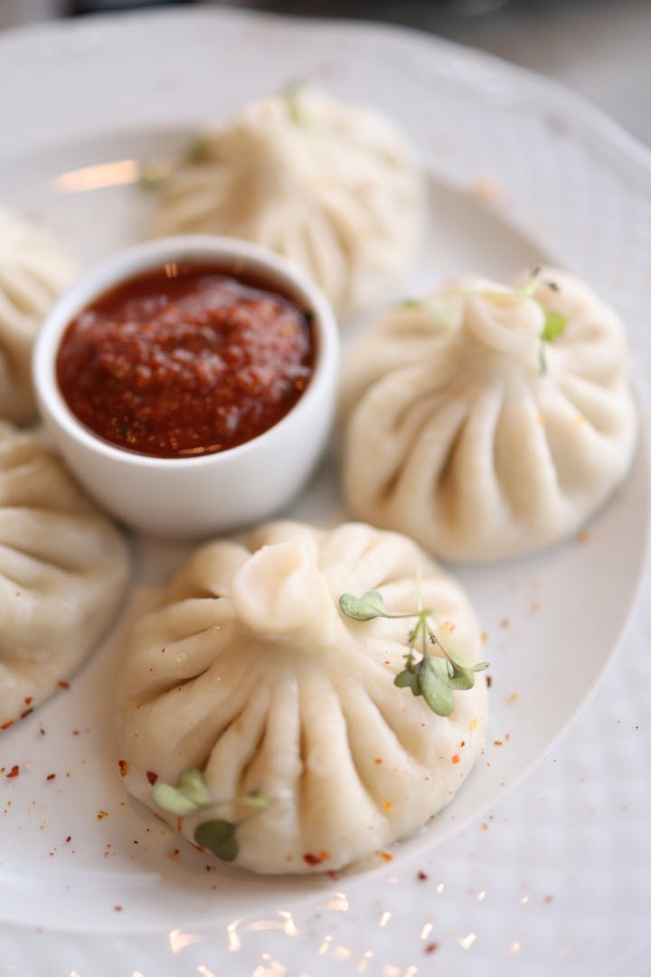Khinkali dumplings with dipping sauce, Georgia's iconic street food
