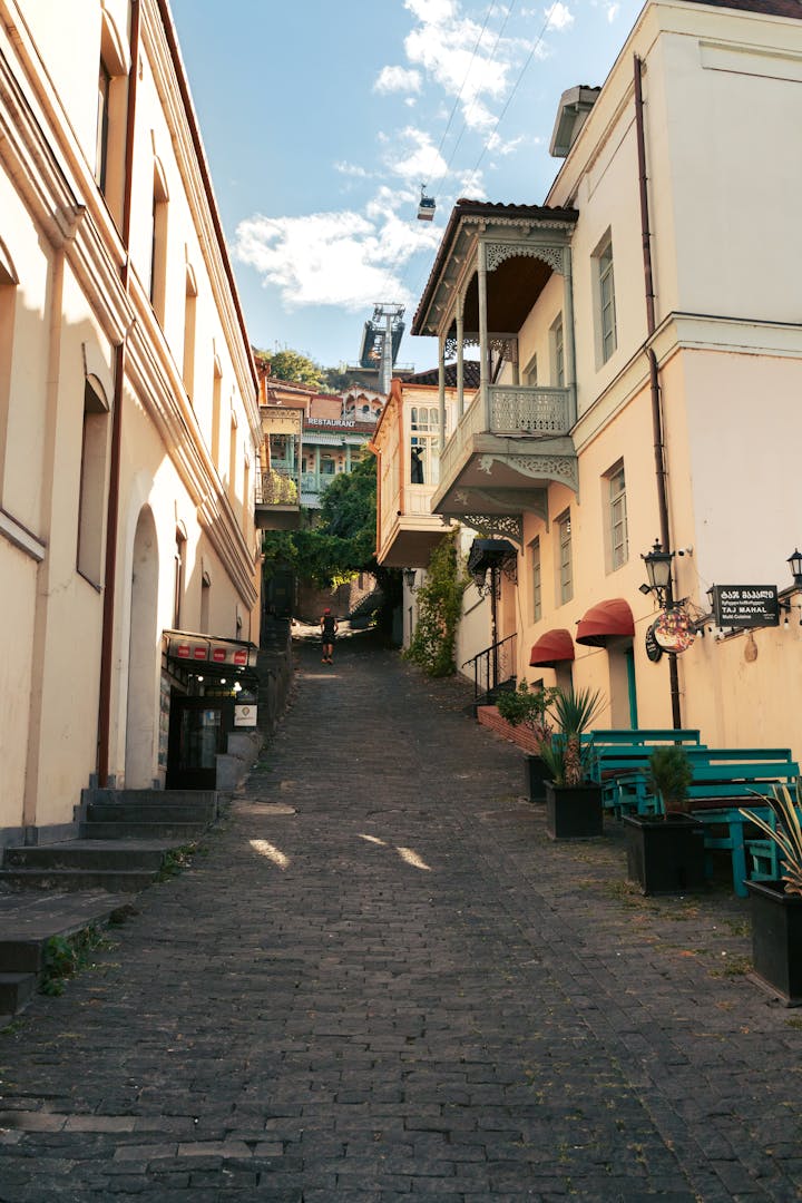 Charming narrow street in Tbilisi's old city with wooden balconies