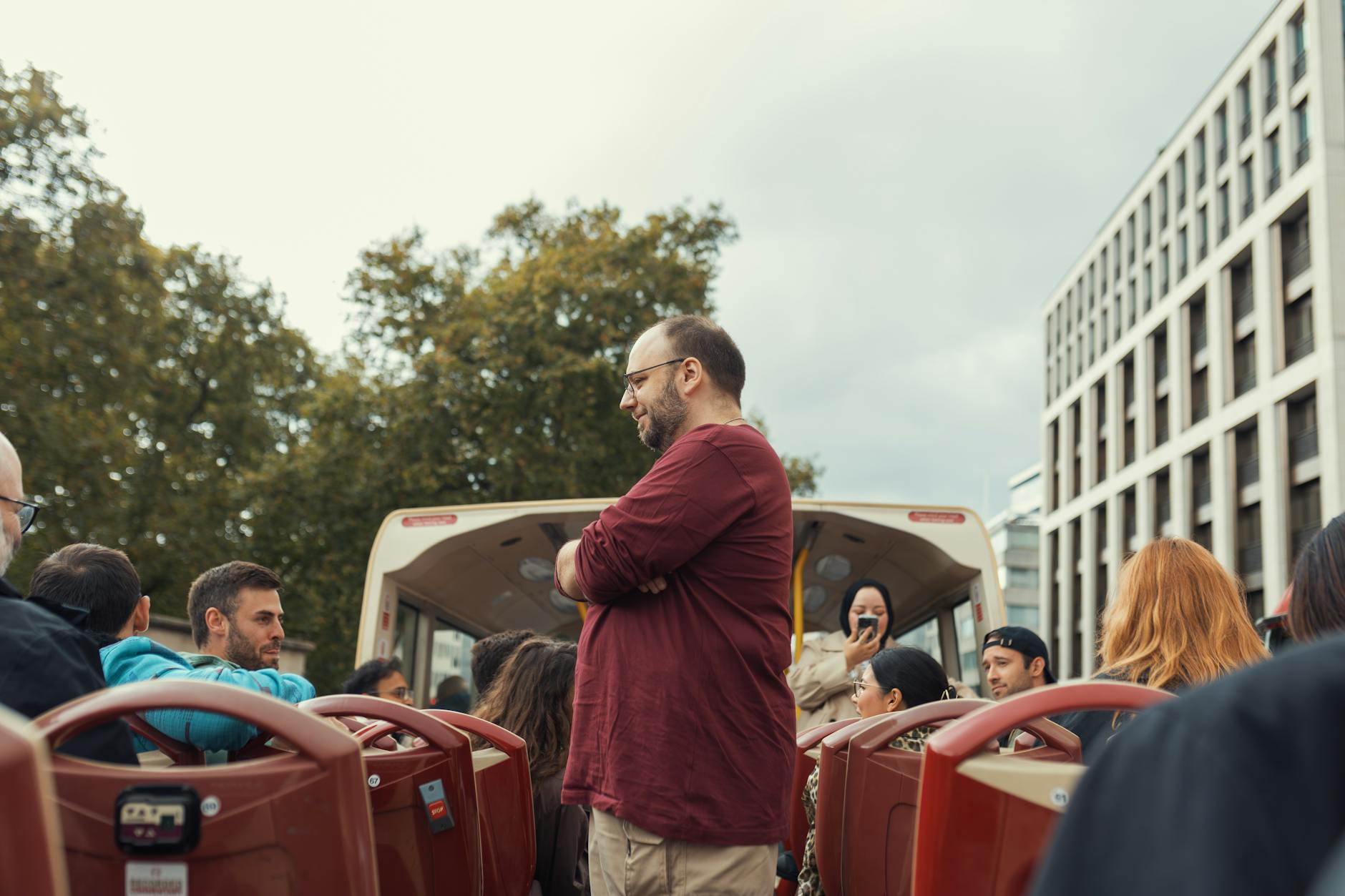 Large group of tourists on a guided sightseeing tour, the format optimized for coverage and cost