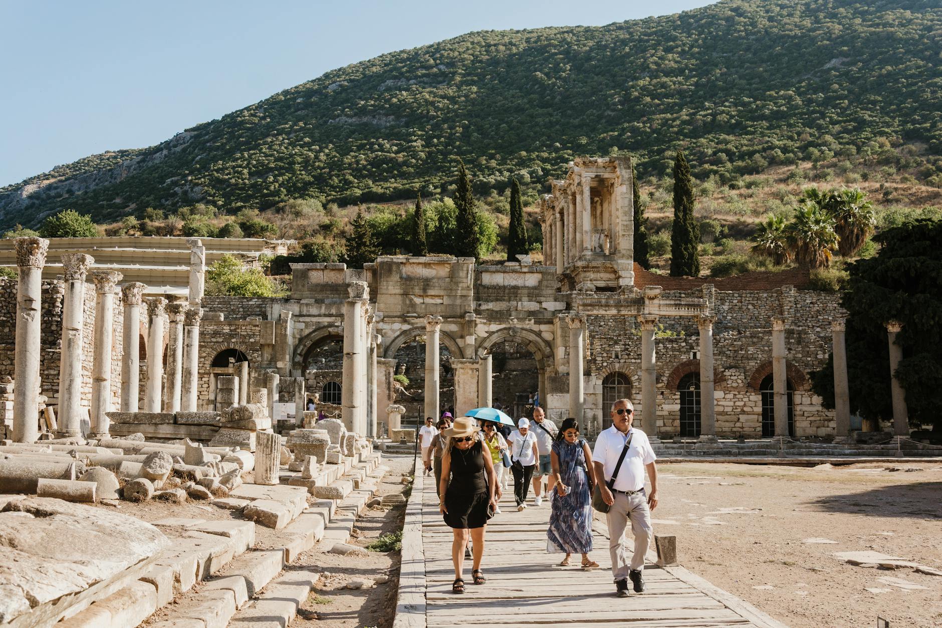 Couple with a private guide at ancient ruins, the format where the itinerary bends to you, not the other way around