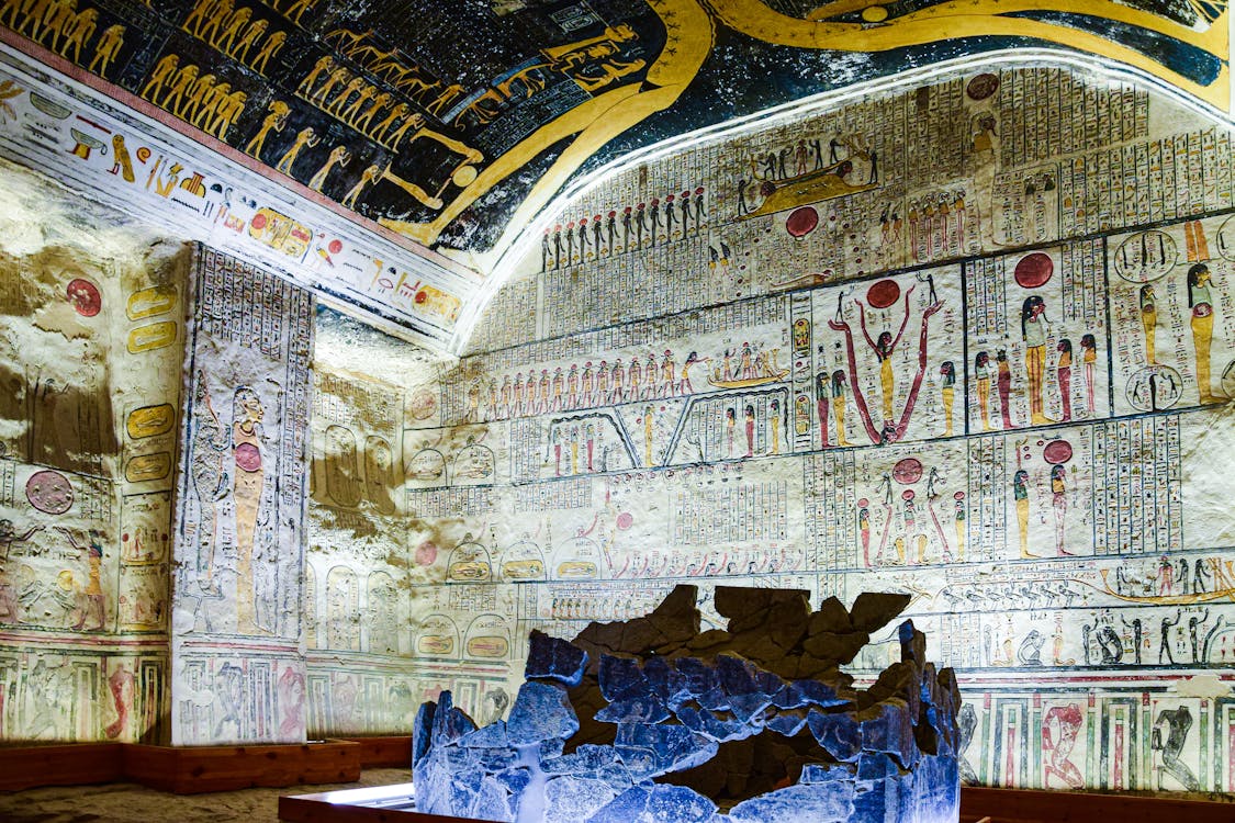Vivid ancient frescoes and hieroglyphs inside a tomb in the Valley of the Kings, Luxor