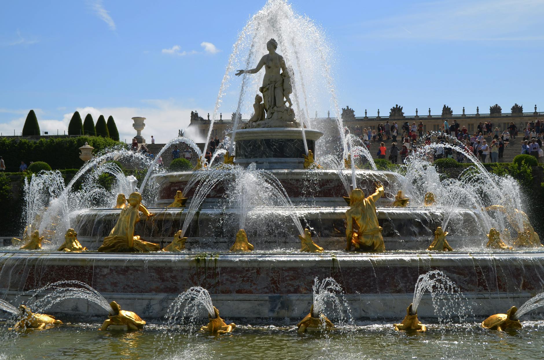 Palace of Versailles formal gardens with fountains stretching toward the horizon