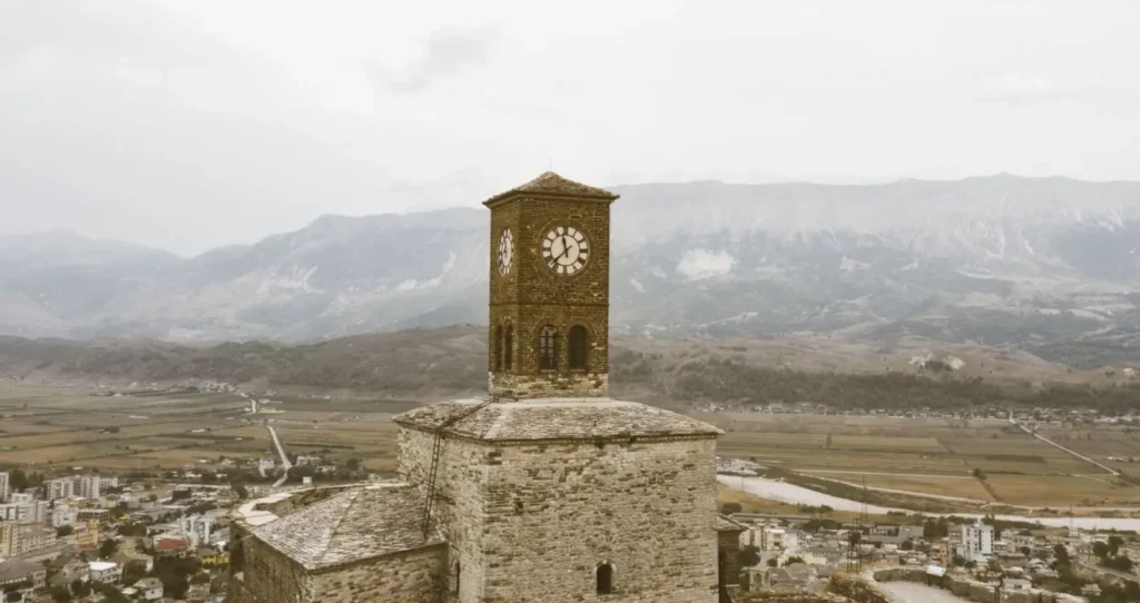 Albania Tours: Why Europe's Best-Kept Secret Is Worth Your Attention in 2026 ToursZoom Gray stone tower houses in Gjirokaster
