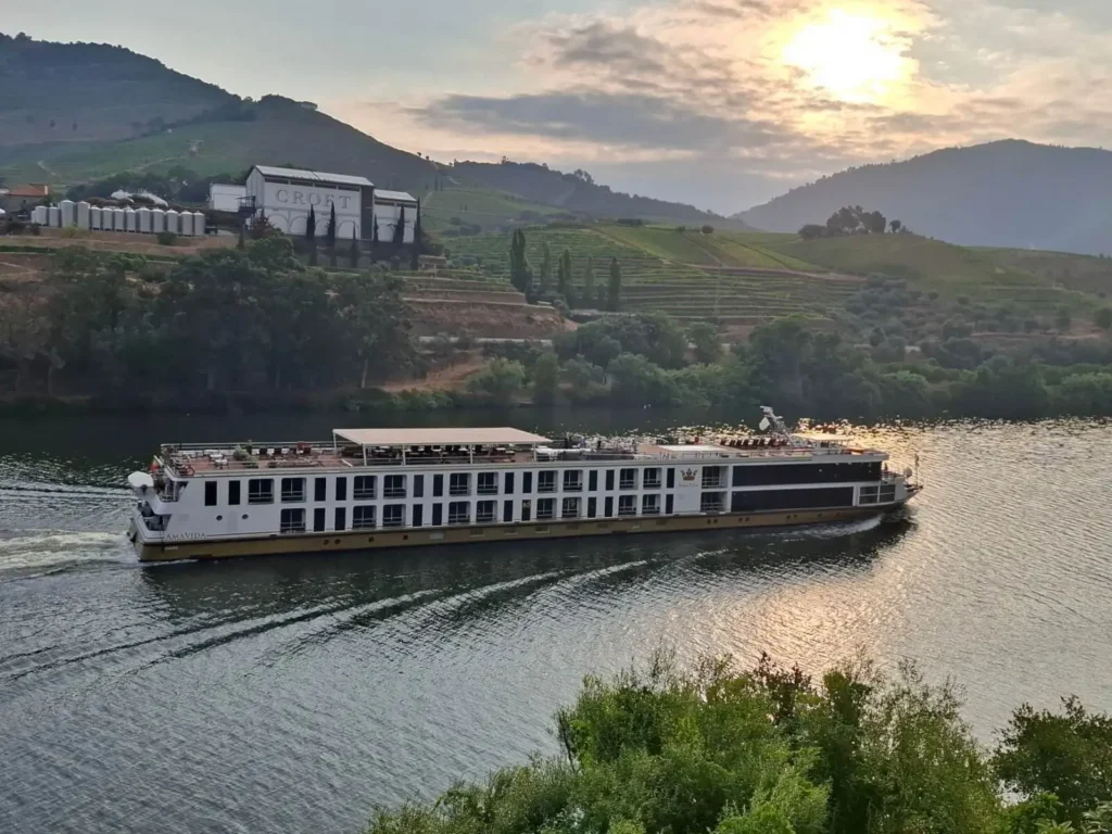 Best Douro River Cruises for First-Timers 2026 ToursZoom Douro River cruise ship terraced vineyards Portugal