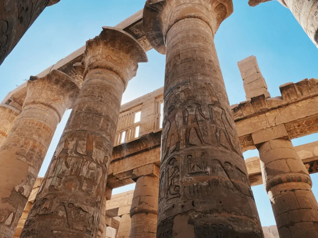 Egypt Nile Cruise: Plan Your Trip & Book Your Stay ToursZoom Sunlight illuminating the ancient columns of Karnak Temple in Luxor