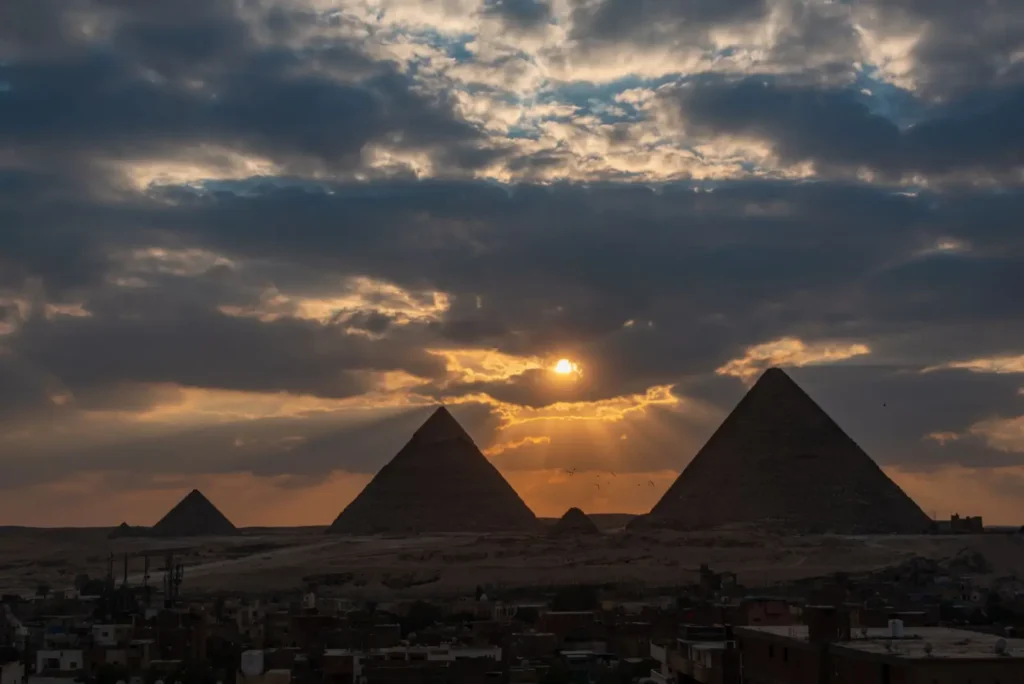 Egypt Nile Cruise: Plan Your Trip & Book Your Stay ToursZoom The Great Pyramid of Giza bathed in the golden light of dusk