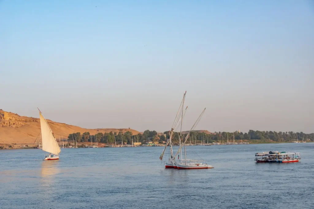 Egypt tours in December: Cooler weather and holiday-season planning ToursZoom The Nile river cruise ship docked at Aswan during a serene December evening