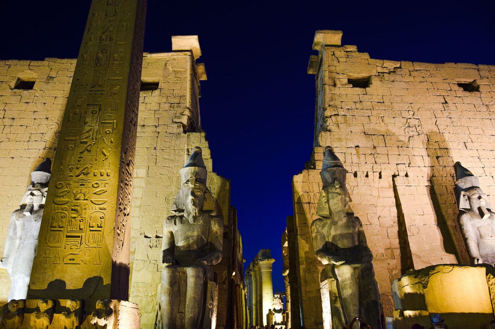 The ancient Luxor temple ruins illuminated by the soft light of a December evening