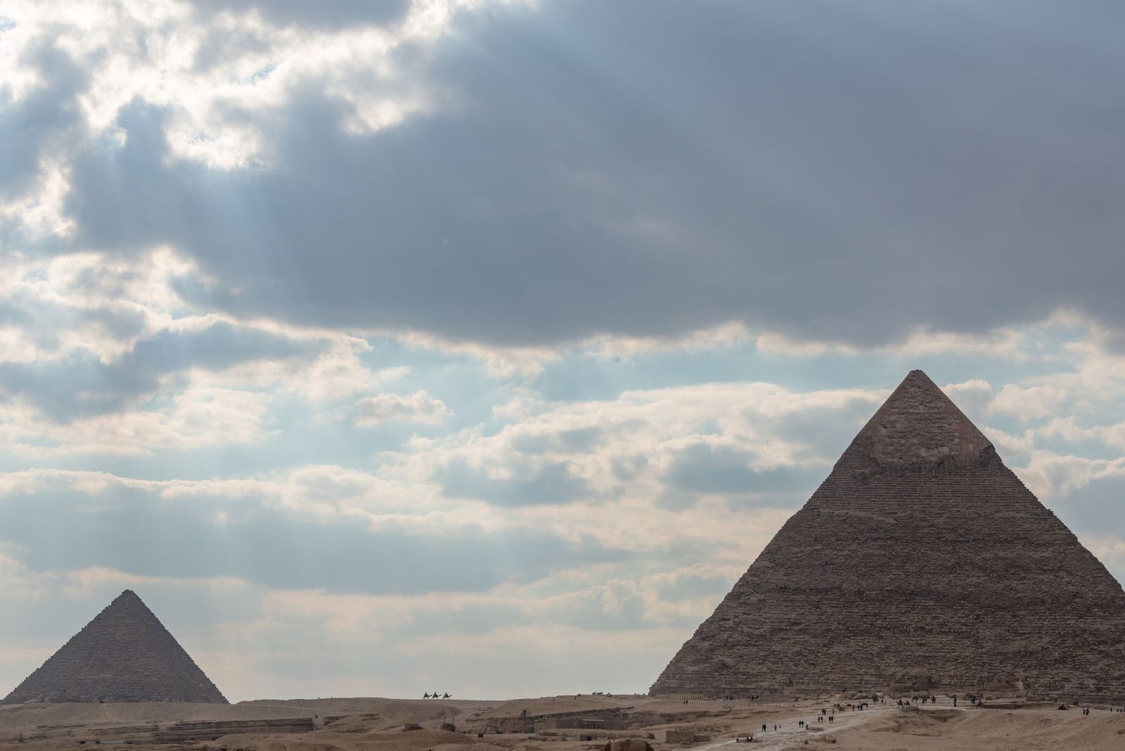 Pyramids of Giza bathed in golden sunlight during a cool January day