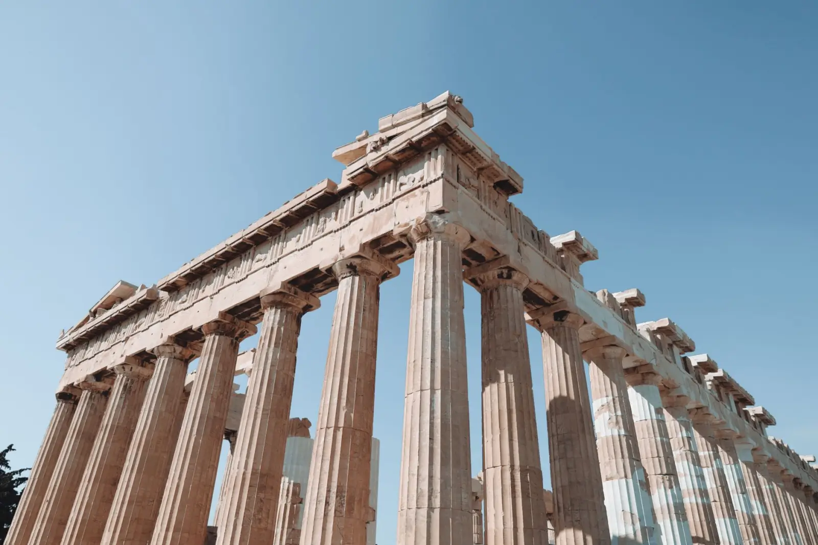 Greece tours in September: Warm seas and calmer post-peak island travel ToursZoom The Acropolis of Athens bathed in golden afternoon light during the summer