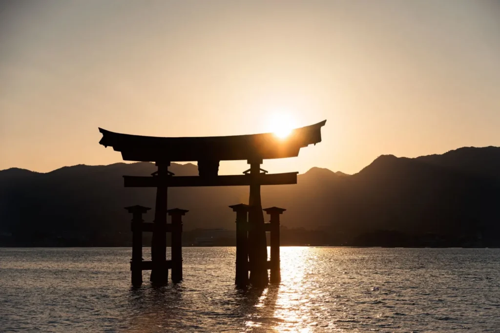 10 Hidden Gems in Japan Only Locals Know About ToursZoom Early morning view of the torii gate at Miyajima Island, Japan