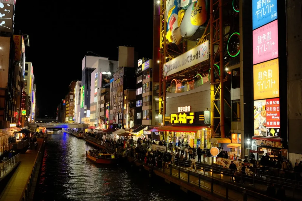 Japan Tours: The Complete 2026 Travel Guide ToursZoom The lively atmosphere of Osaka's Dotonbori street food market at night