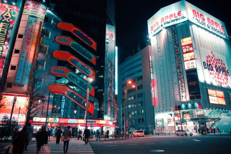 Akihabara's neon-lit streets at dusk, showcasing the vibrant electronics and anime culture