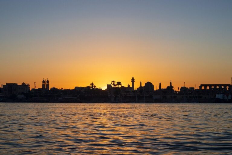 Luxor Temple at sunset along the Nile River