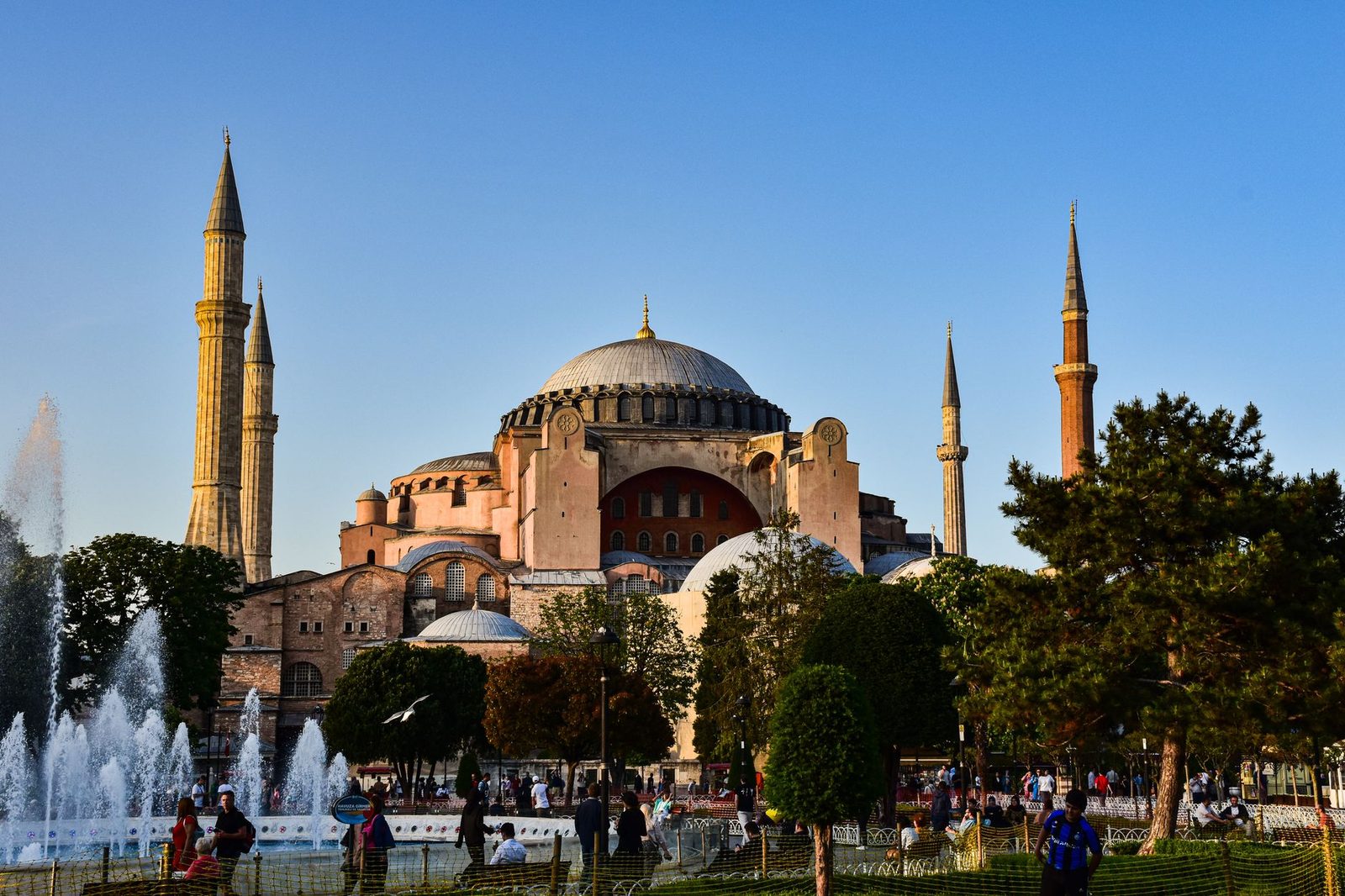 Golden light illuminates the Hagia Sophia's interior during an autumn afternoon