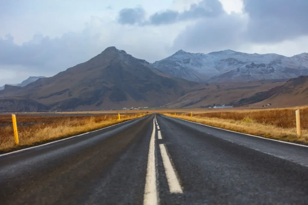A bus tour driving along Iceland's iconic Ring Road