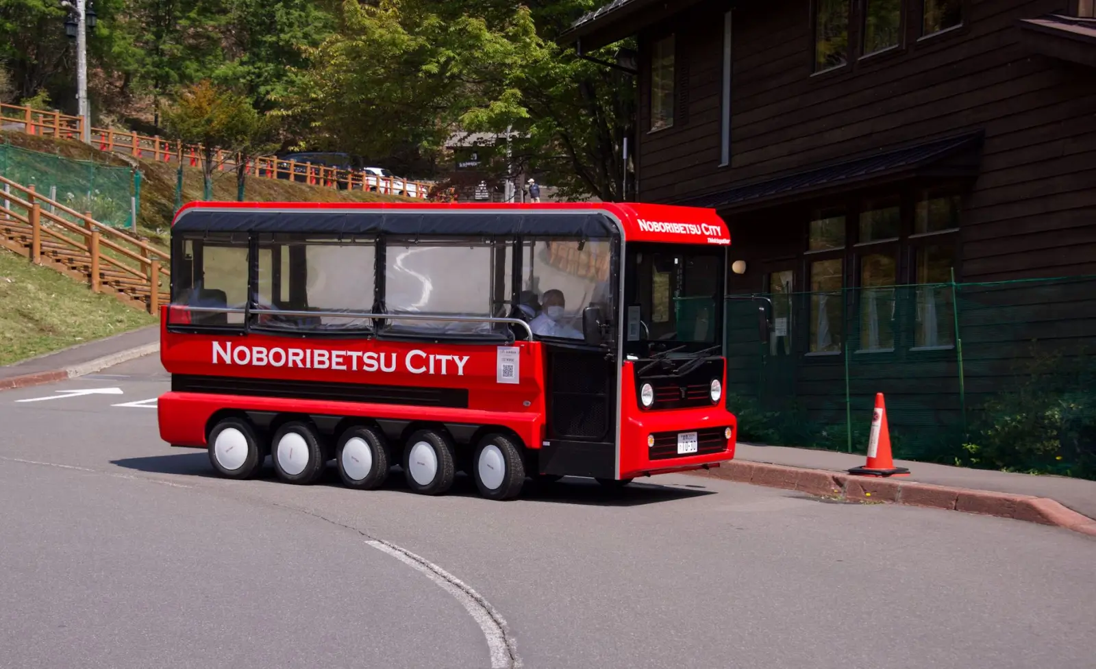 A guided walking segment within a Japan itinerary that includes both walking tours and bus transfers